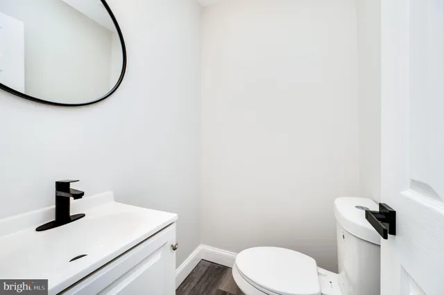 a bathroom with a toilet and a sink