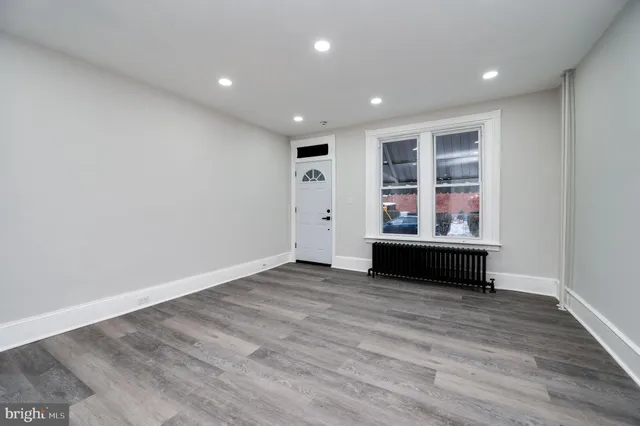 a view of workspace with wooden floor