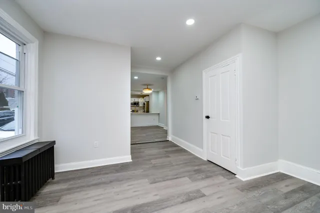 a view of entryway with wooden floor