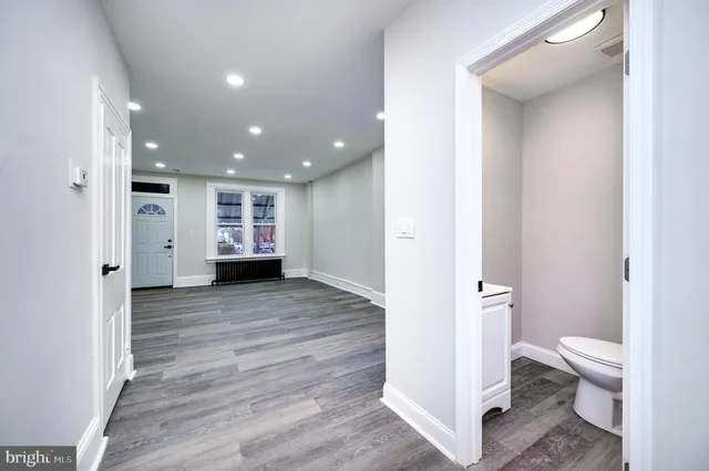 a view of bathroom with a toilet and a shower
