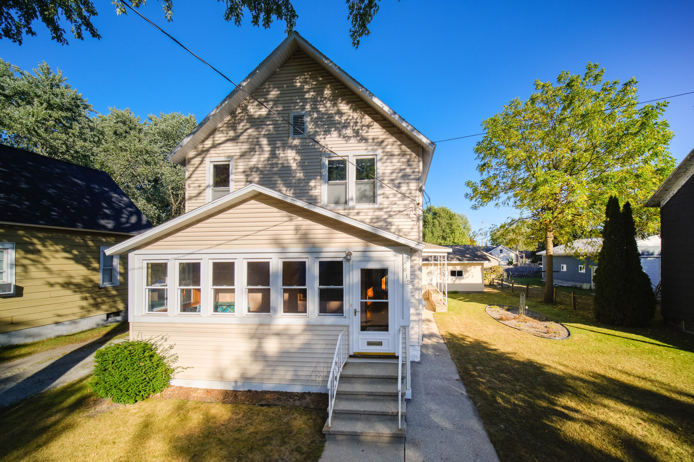 613 Ramsdell Street Manistee, MI 49660 - Photo 1 of 49 Front of Home