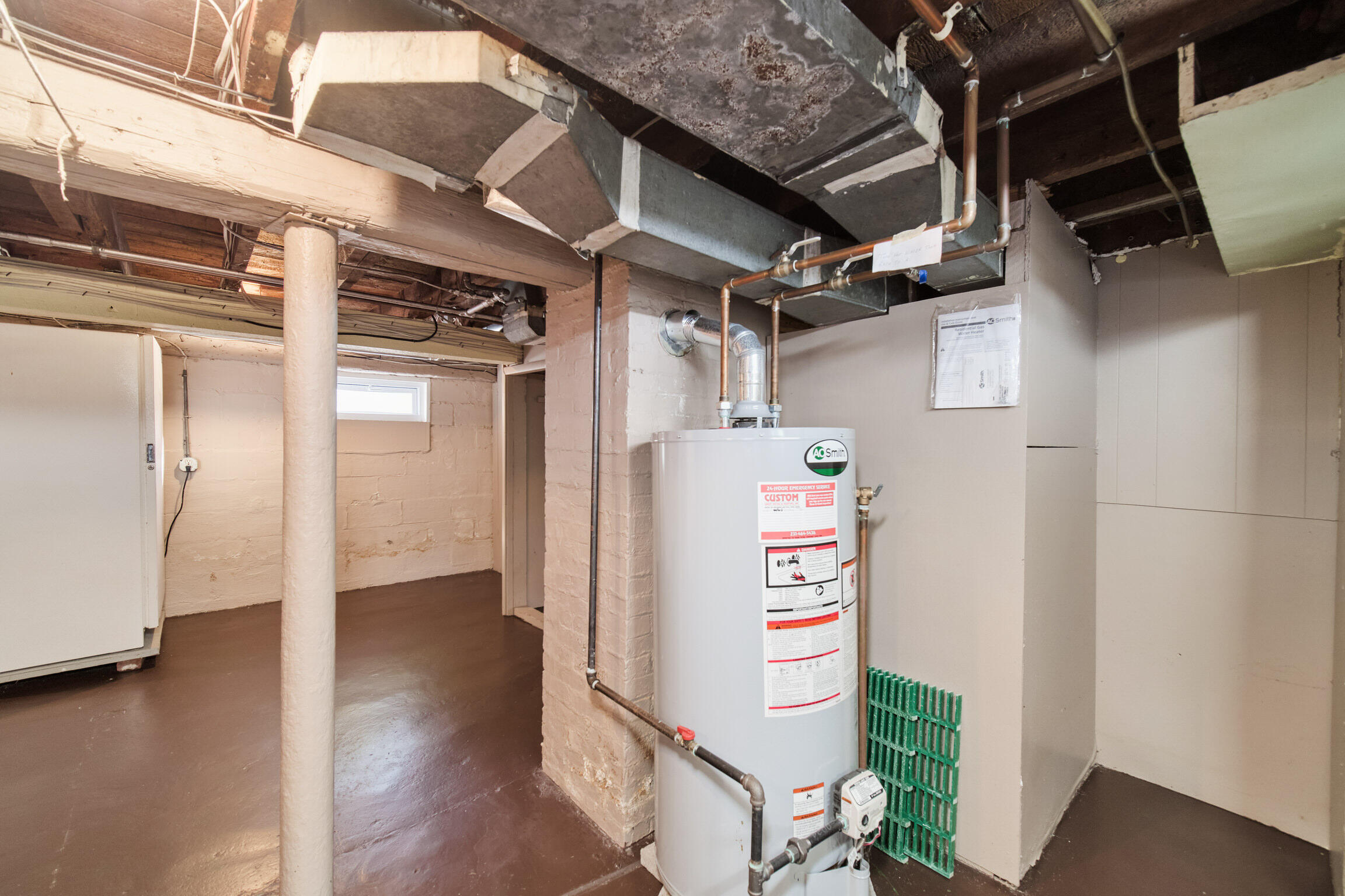 613 Ramsdell Street Manistee, MI 49660 - Photo 42 of 49 Hot Water Heater