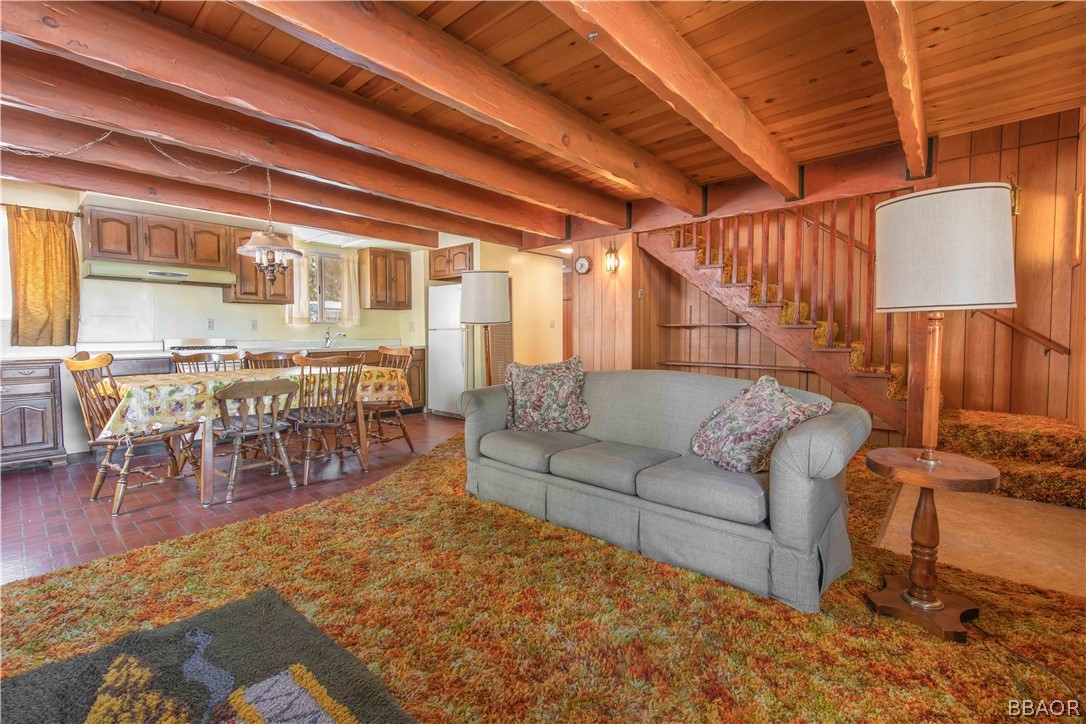 458 Edgemoor Road Big Bear Lake, CA 92315 - Photo 12 of 47 a living room with furniture a wooden floor and next to a window