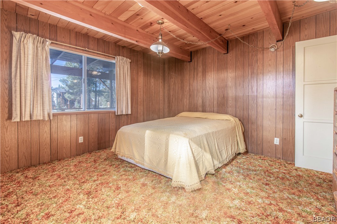 458 Edgemoor Road Big Bear Lake, CA 92315 - Photo 24 of 47 a bedroom with a bed and a window