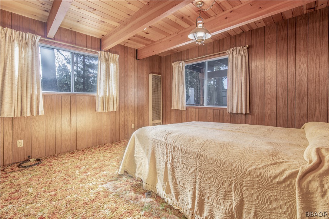 458 Edgemoor Road Big Bear Lake, CA 92315 - Photo 25 of 47 a bedroom with a bed and a window