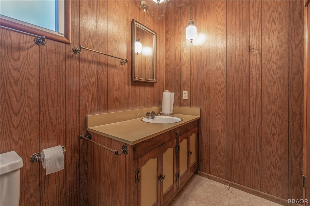 458 Edgemoor Road Big Bear Lake, CA 92315 - Photo 30 of 47 a bathroom with a sink and a mirror