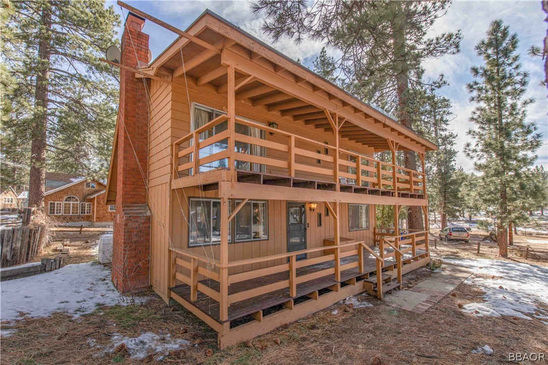 458 Edgemoor Road Big Bear Lake, CA 92315 - Photo 3 of 47 a front view of a house with a yard