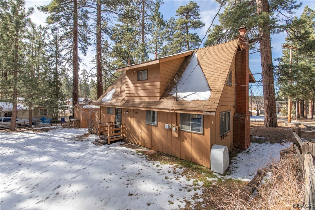 458 Edgemoor Road Big Bear Lake, CA 92315 - Photo 35 of 47 a view of a house with a yard