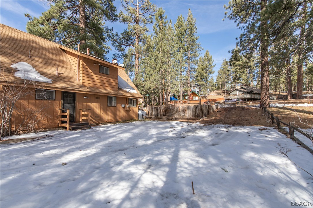 458 Edgemoor Road Big Bear Lake, CA 92315 - Photo 41 of 47 a view of a house with a yard