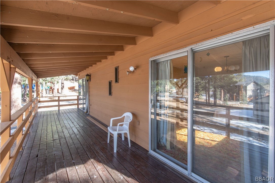 458 Edgemoor Road Big Bear Lake, CA 92315 - Photo 45 of 47 a view of a porch with wooden floor