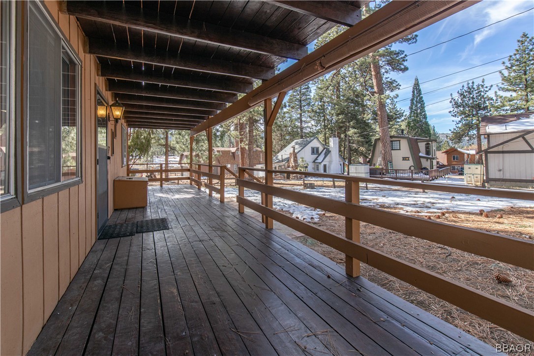 458 Edgemoor Road Big Bear Lake, CA 92315 - Photo 7 of 47 a view of a porch with wooden floor