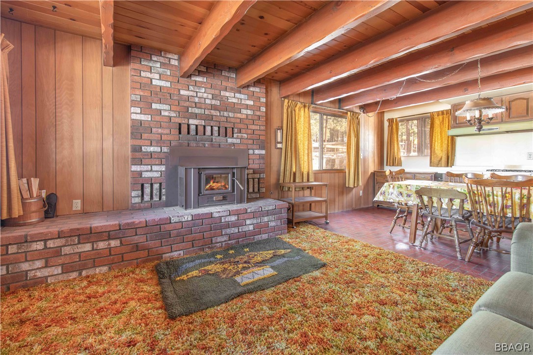 458 Edgemoor Road Big Bear Lake, CA 92315 - Photo 10 of 47 a living room with furniture and a fireplace