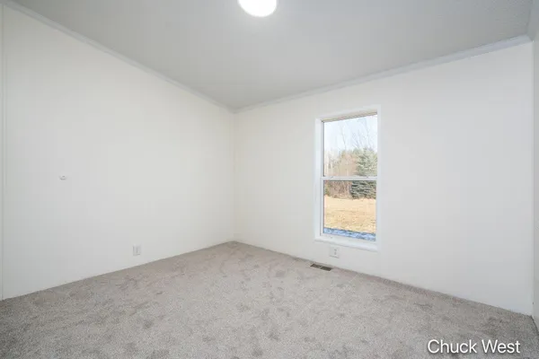 $220,000 | 20436 Freedom Drive, Pierson, MI 49339