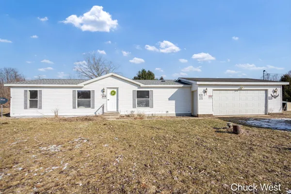 $220,000 | 20436 Freedom Drive, Pierson, MI 49339