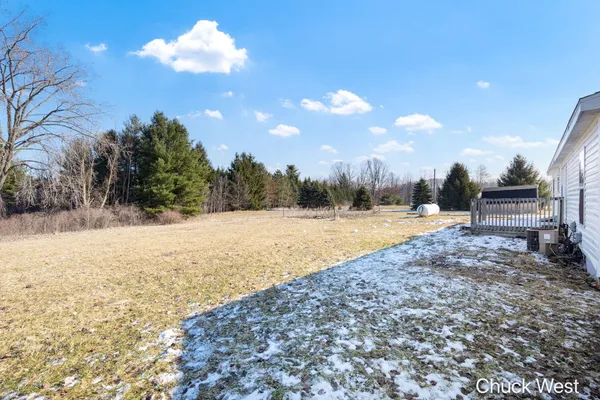 $220,000 | 20436 Freedom Drive, Pierson, MI 49339