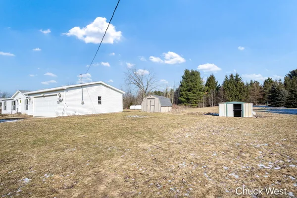 $220,000 | 20436 Freedom Drive, Pierson, MI 49339