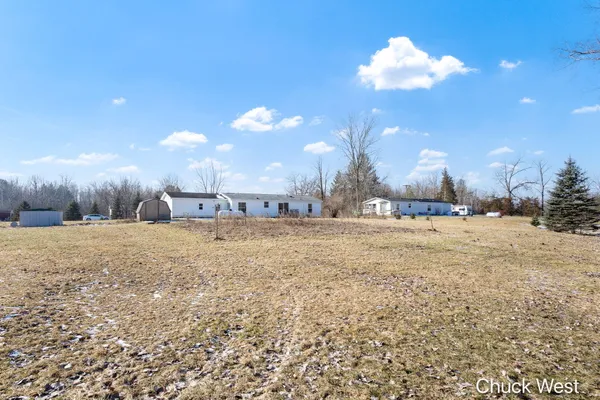 $220,000 | 20436 Freedom Drive, Pierson, MI 49339