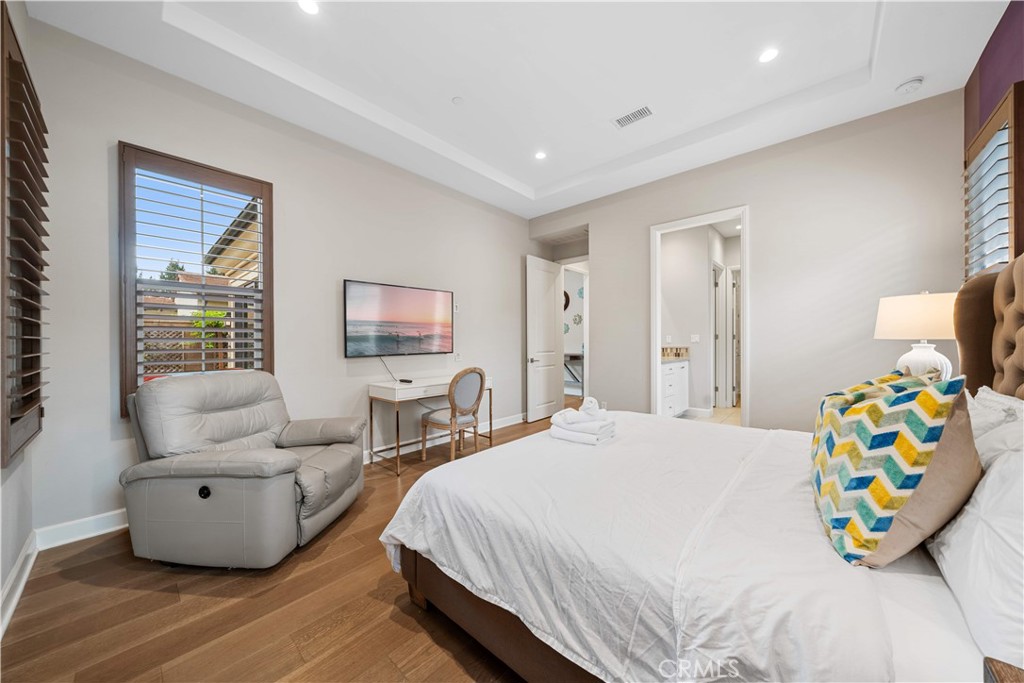 114 Guinness Irvine, CA 92620 - Photo 20 of 43 a bedroom with a bed and a couch