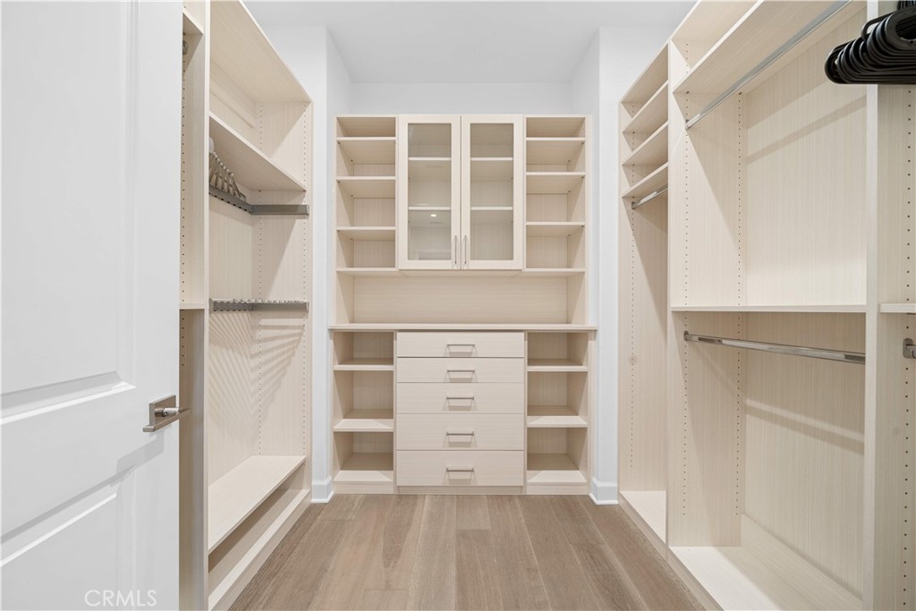 114 Guinness Irvine, CA 92620 - Photo 23 of 43 a view of walk in closet with empty racks