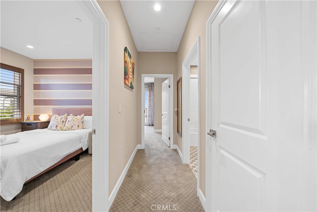 114 Guinness Irvine, CA 92620 - Photo 27 of 43 a view of a bedroom with a bed and a window