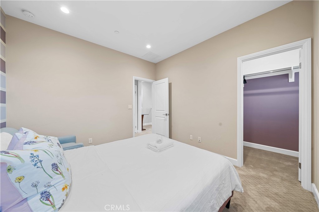 114 Guinness Irvine, CA 92620 - Photo 29 of 43 a bedroom with a bed and a window