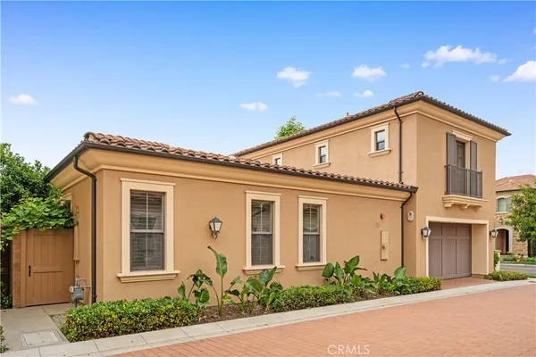 a front view of a house with yard