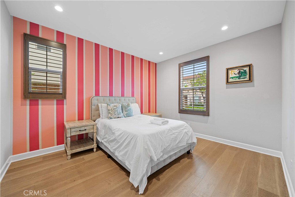 114 Guinness Irvine, CA 92620 - Photo 6 of 43 a bedroom with a bed and a window
