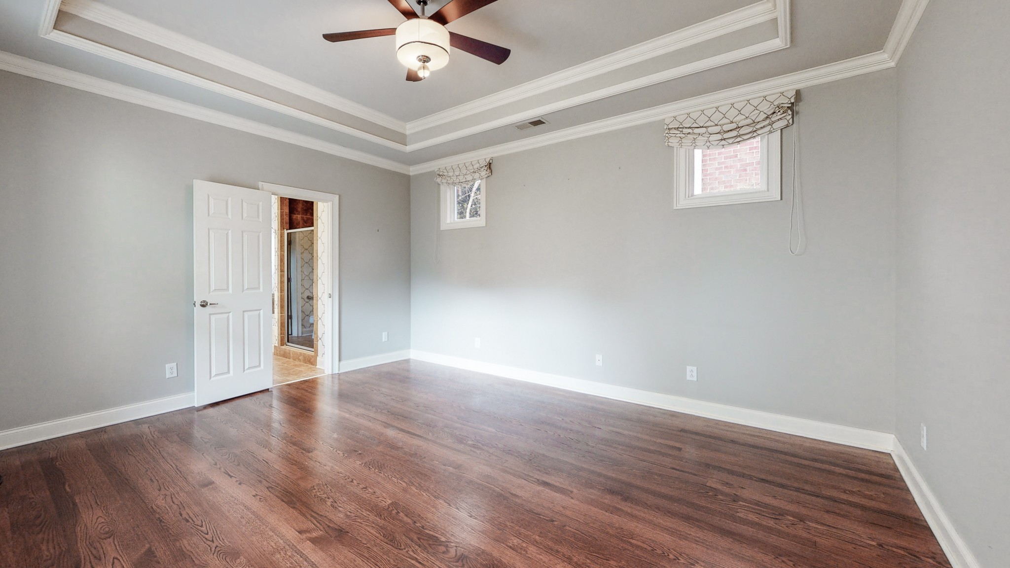 718 Pearre Springs Way Franklin, TN 37064 - Photo 19 of 46 a view of an empty room with wooden floor