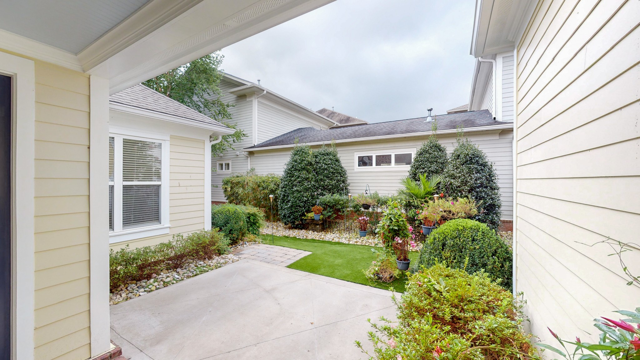 718 Pearre Springs Way Franklin, TN 37064 - Photo 40 of 46 a view of a house with a garden