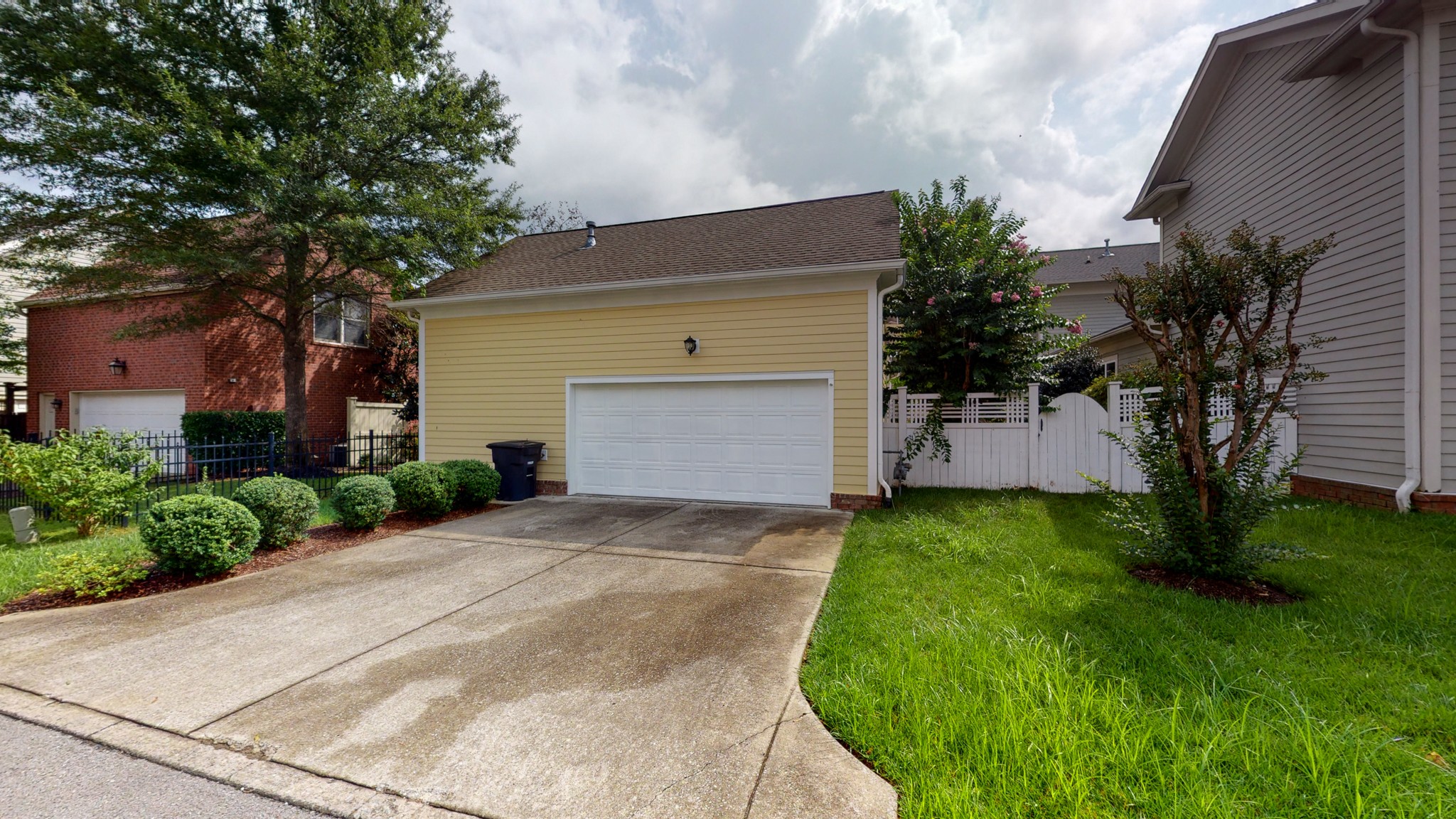 718 Pearre Springs Way Franklin, TN 37064 - Photo 41 of 46 a front view of a house with a yard and garage