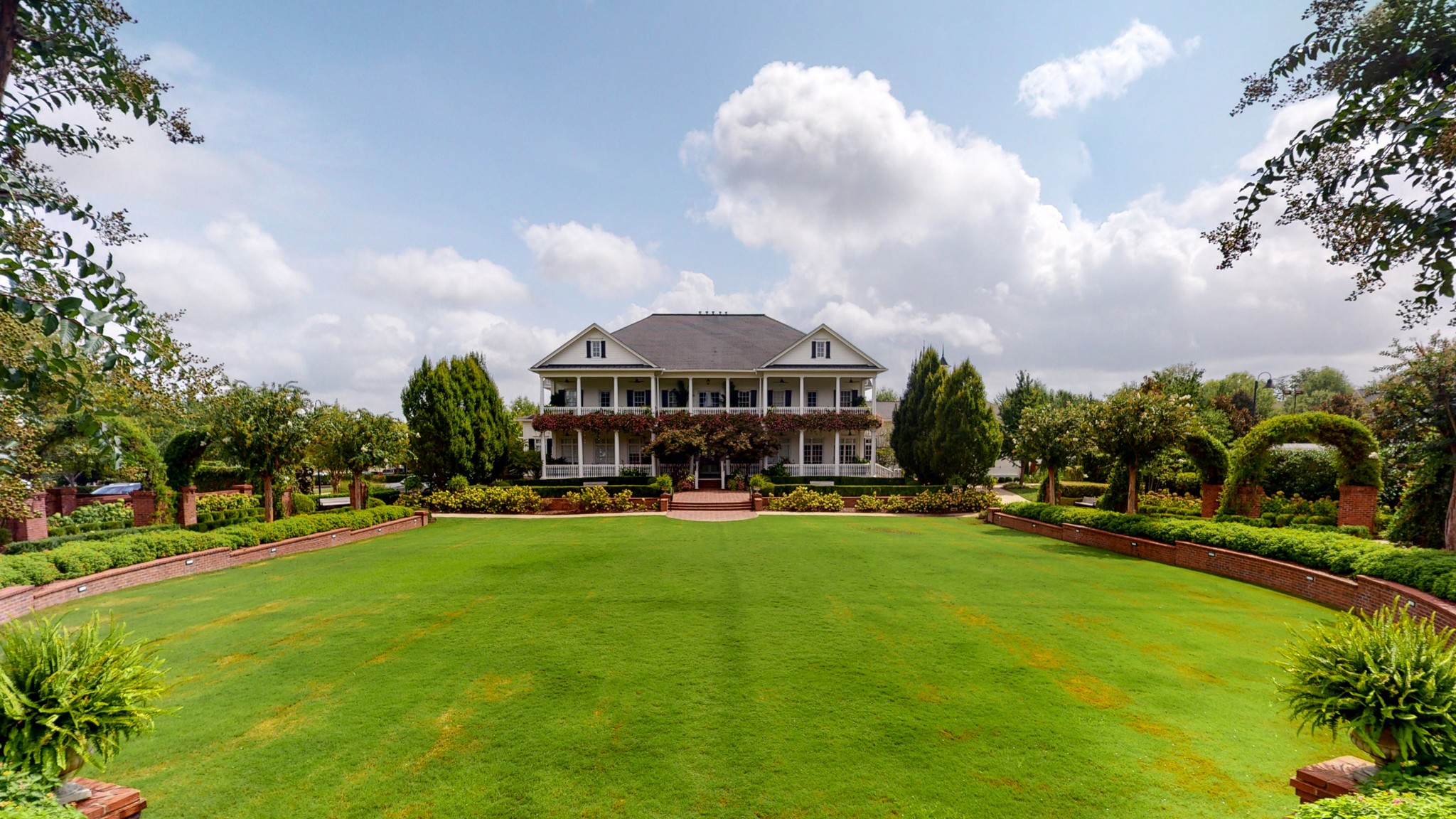 718 Pearre Springs Way Franklin, TN 37064 - Photo 42 of 46 a view of a big yard with table and chairs under an umbrella