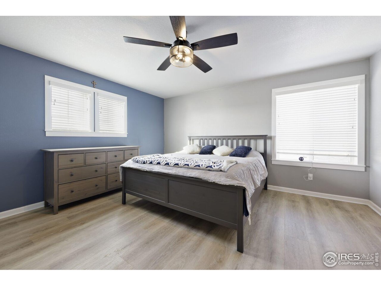 6112 Black Mesa Road Frederick, CO 80516 - Photo 18 of 45 a bedroom with a bed and a window