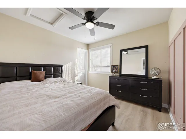 a en suite bathroom with a sink double vanity and a mirror