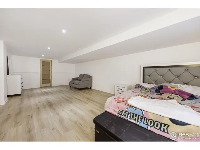 a view of a livingroom with furniture and wooden floor