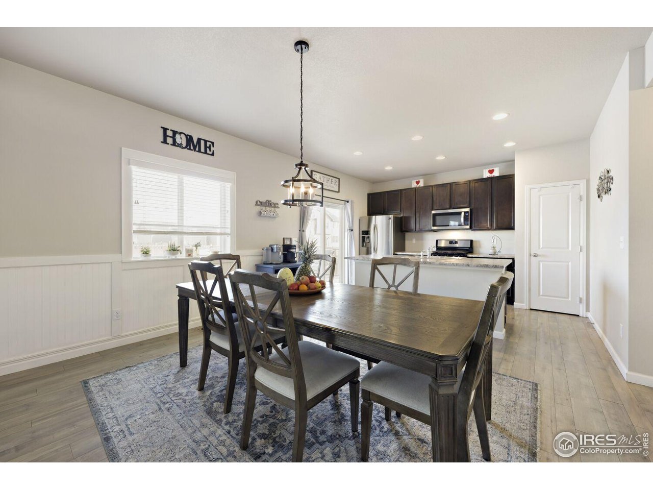 6112 Black Mesa Road Frederick, CO 80516 - Photo 3 of 45 a view of a dining room and livingroom