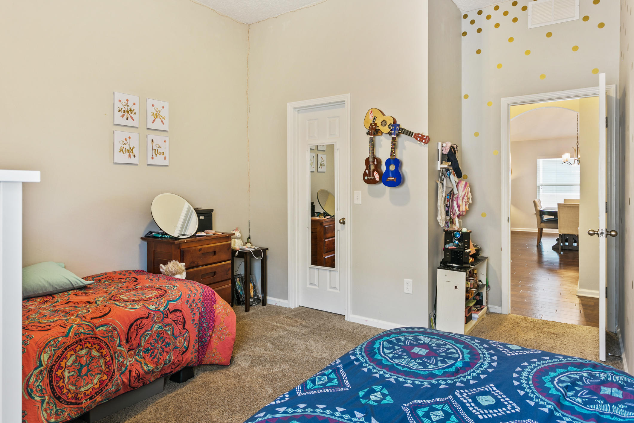 1365 Royal Dornoch Drive Jacksonville, FL 32221 - Photo 20 of 32 a bedroom with a bed and a table in it