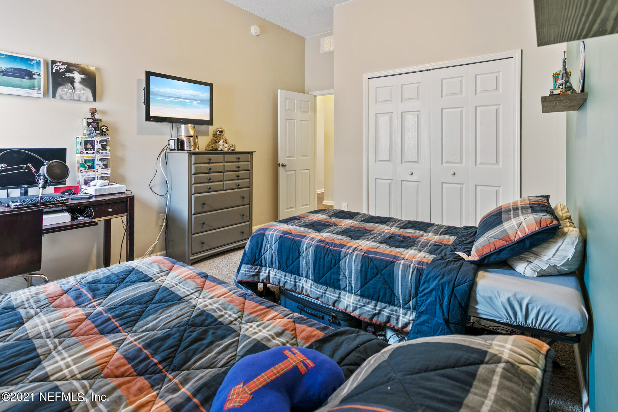 1365 Royal Dornoch Drive Jacksonville, FL 32221 - Photo 22 of 32 a bedroom with bed and a closet