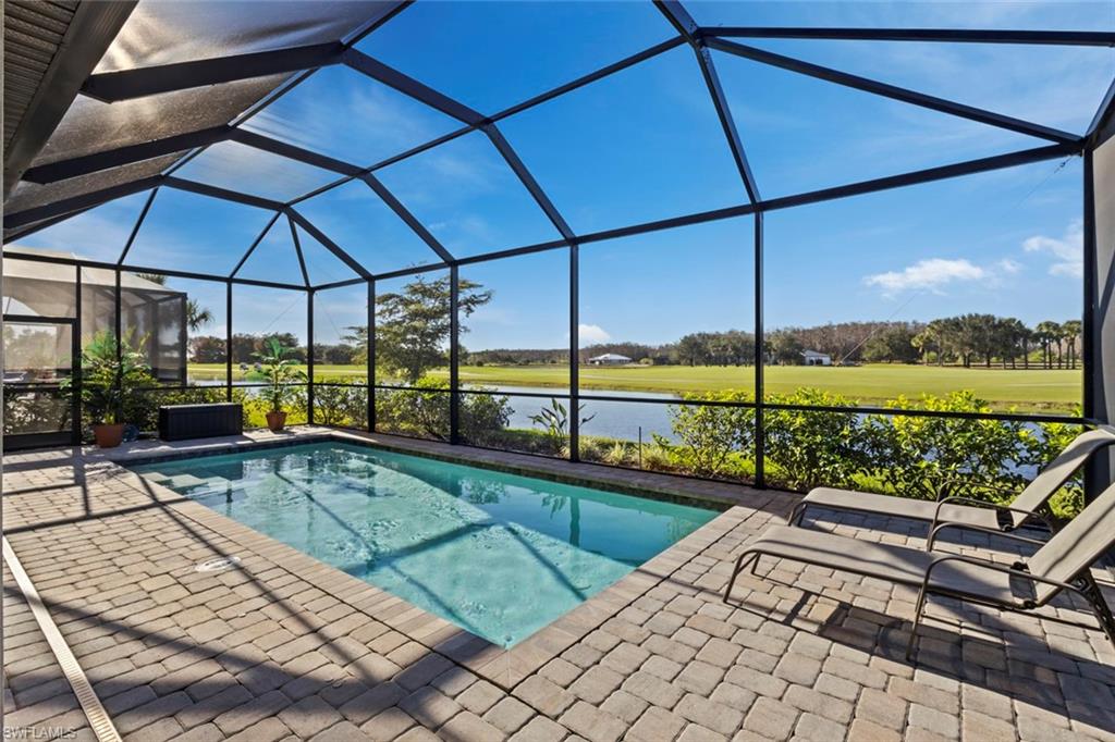 a view of a swimming pool with a porch