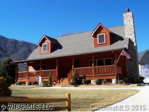 212 Campbell Creek Road Maggie Valley, NC 28751 - Photo 1 of 9 a view of a house with a yard