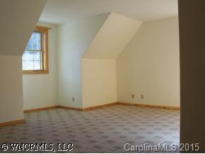 212 Campbell Creek Road Maggie Valley, NC 28751 - Photo 8 of 9 an empty room with an entryway