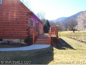 212 Campbell Creek Road Maggie Valley, NC 28751 - Photo 9 of 9 a view of a yard with an outdoor space