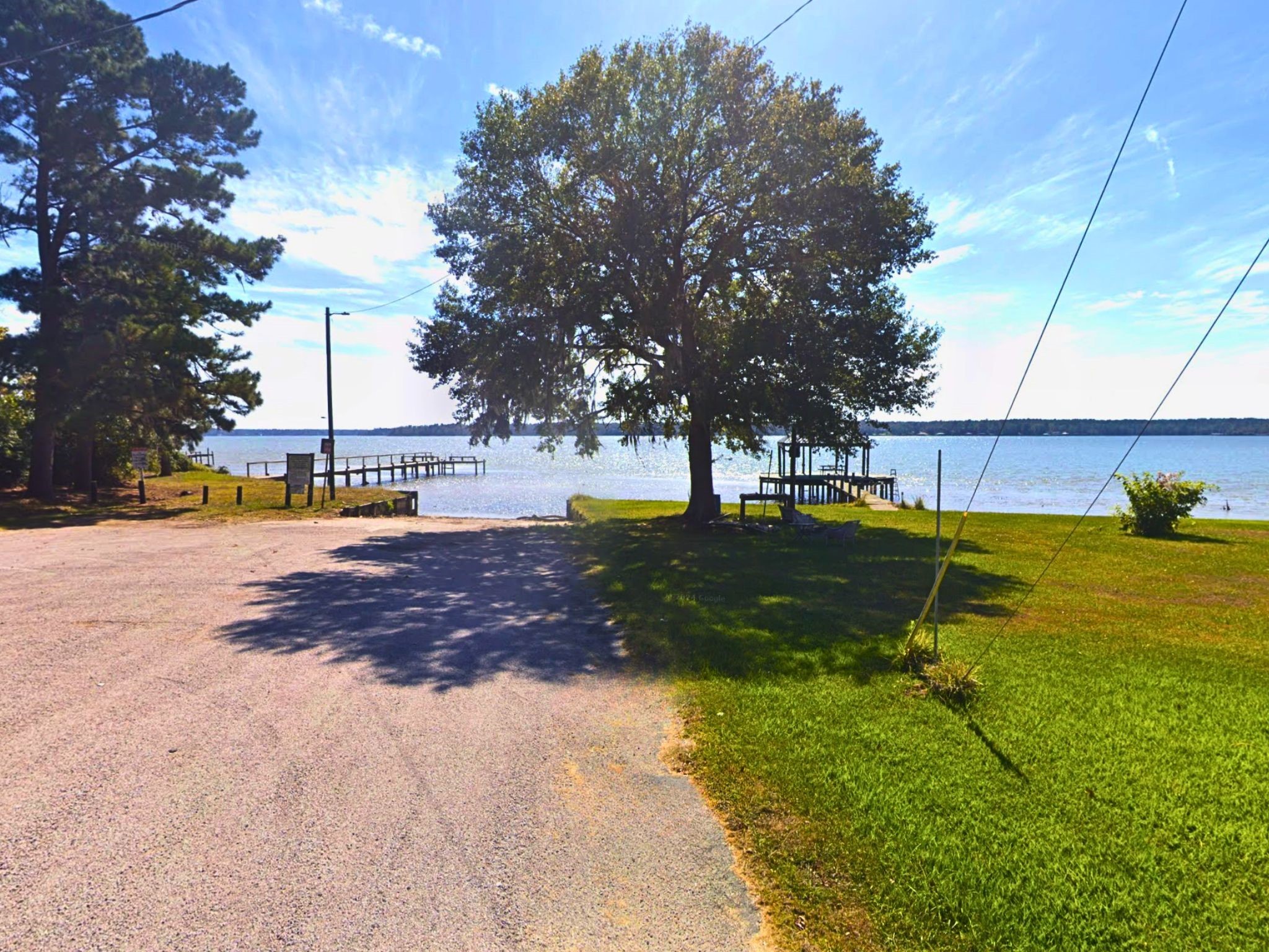 275 18th Street Trinity, TX 75862 - Photo 3 of 18 a view of a park with swings and slides
