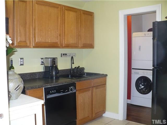 216 Myers Avenue Raleigh, NC 27604 - Photo 5 of 21 a kitchen with stainless steel appliances granite countertop a sink stove and refrigerator