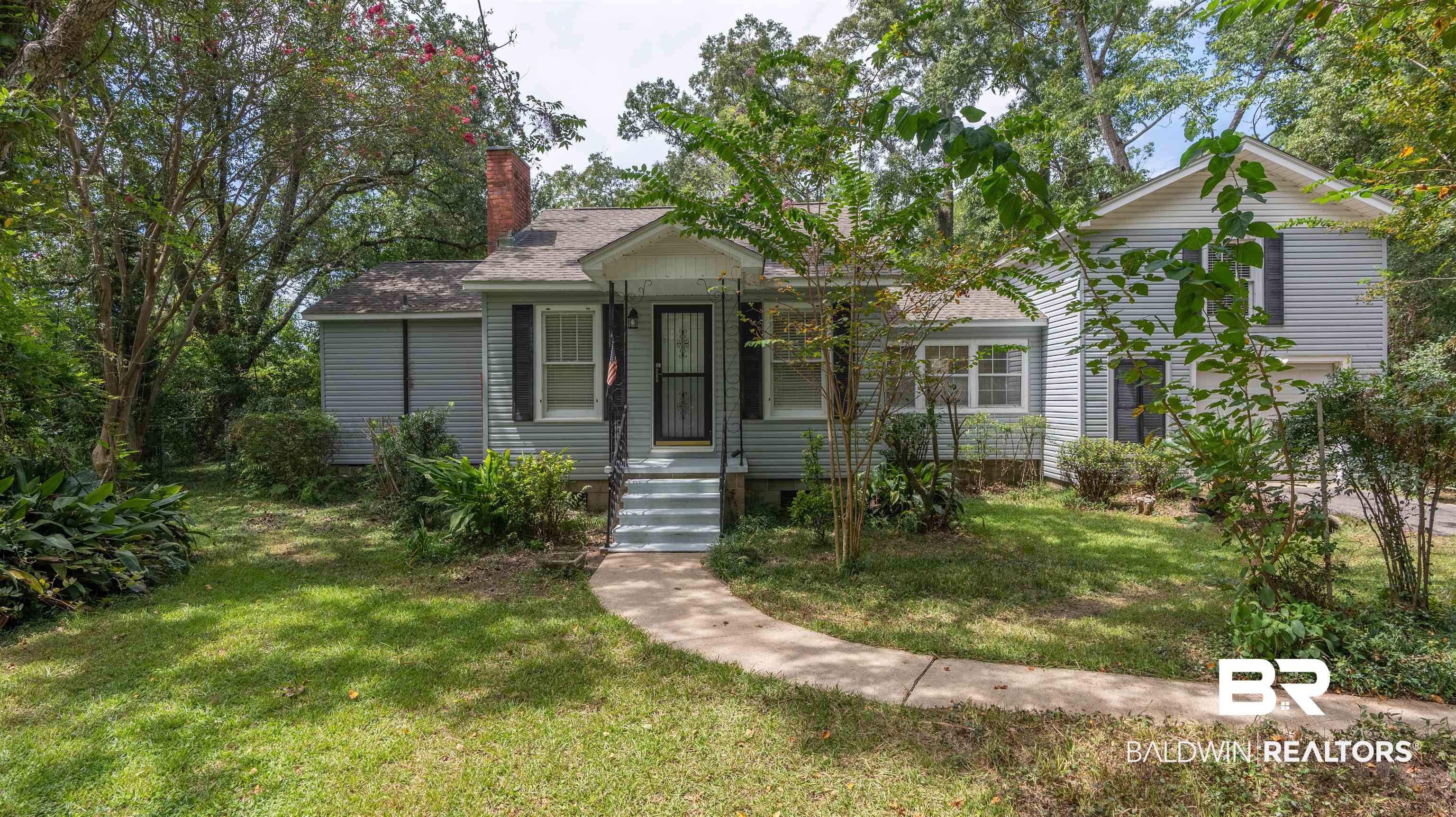 2126 Barron Place Mobile, AL 36605 - Photo 1 of 33 View of front of house with a front yard
