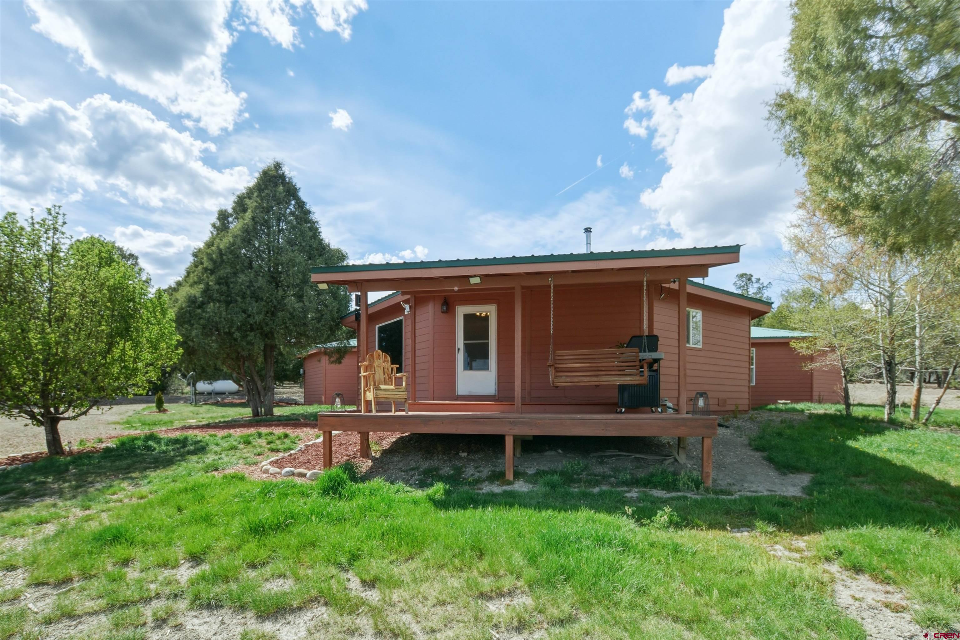 36283 Rd K.3 Mancos, CO 81328 - Photo 28 of 37 a view of a house with a backyard