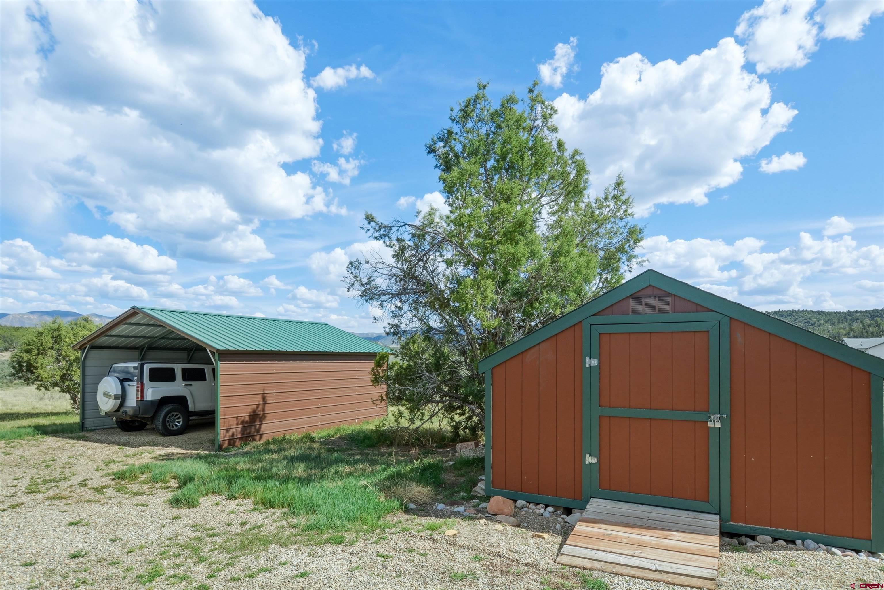 36283 Rd K.3 Mancos, CO 81328 - Photo 31 of 37 a front view of a house with garden