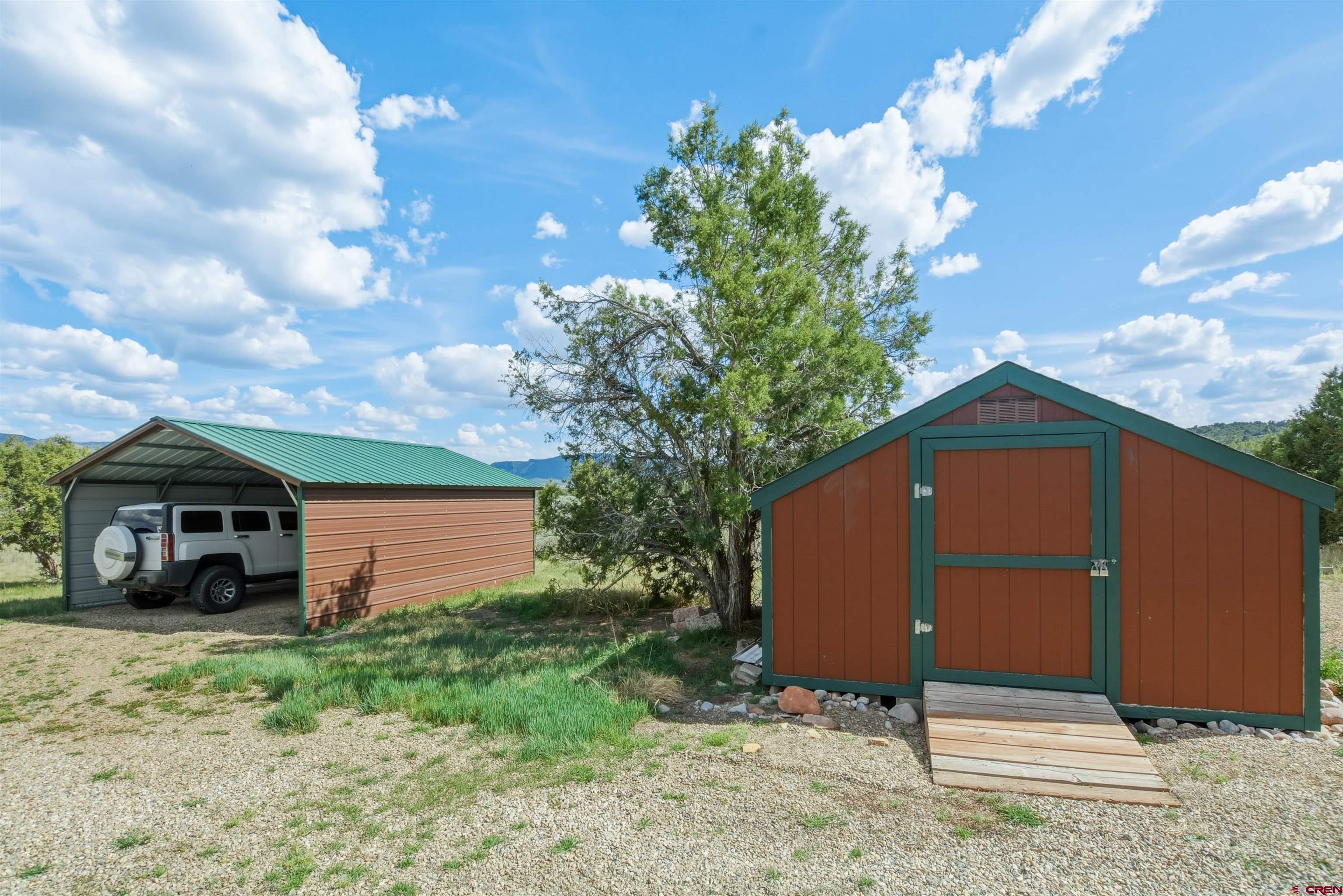 36283 Rd K.3 Mancos, CO 81328 - Photo 32 of 37 a front view of a house with garden