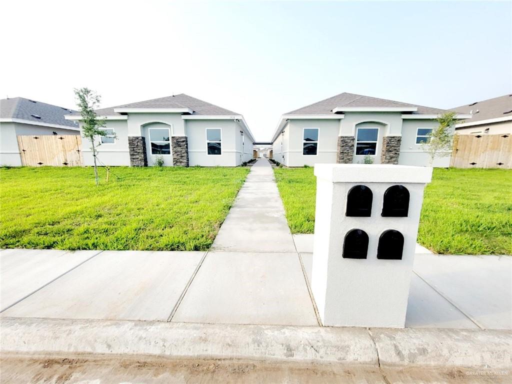 1908 Davenport Street, Unit 1 Weslaco, TX 78596 - Photo 5 of 21 a house view with a outdoor space