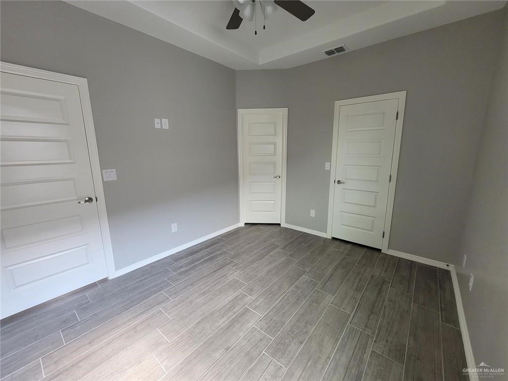 1908 Davenport Street, Unit 1 Weslaco, TX 78596 - Photo 9 of 21 wooden floor in an empty room