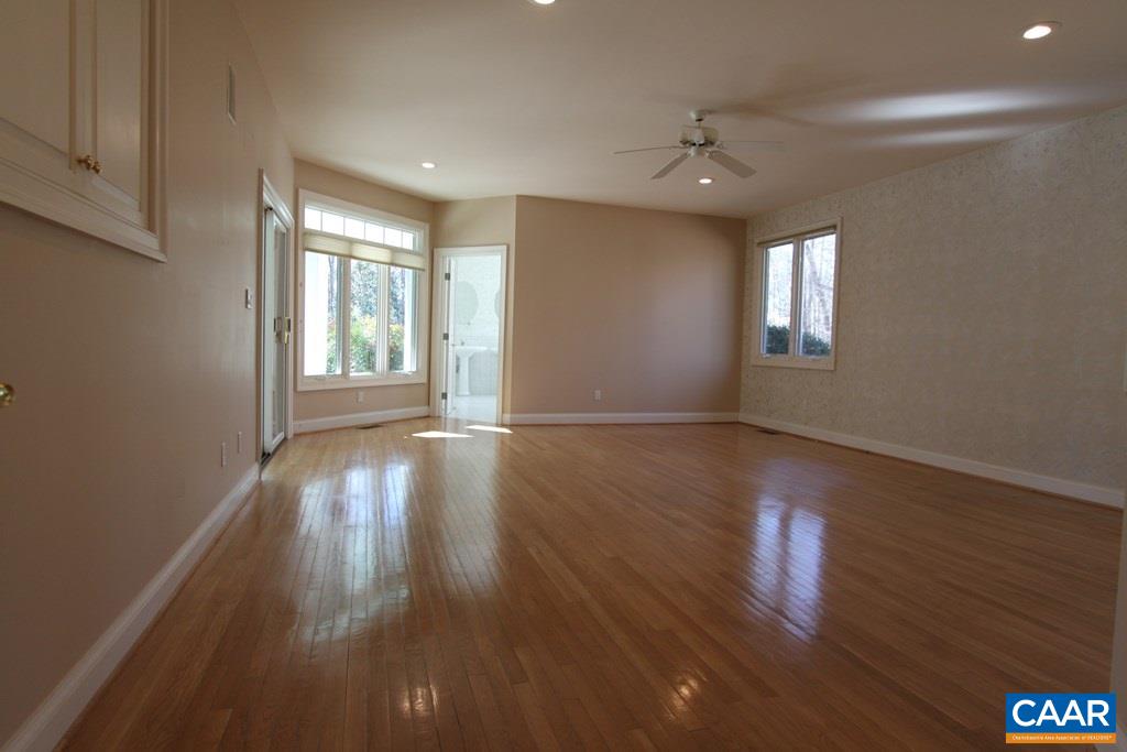 245 Terrell Road West Charlottesville, VA 22901 - Photo 12 of 23 wooden floor in an empty room with a window